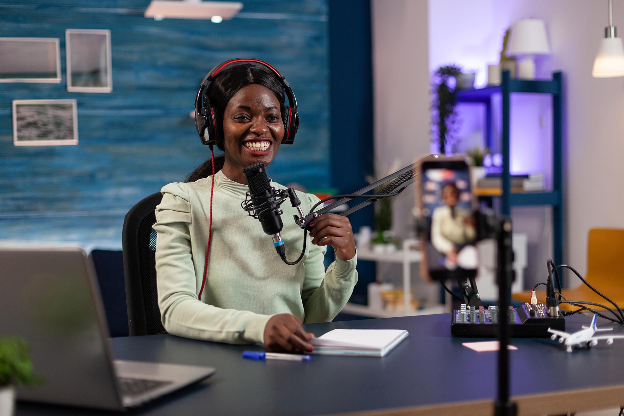 news radio host smiling